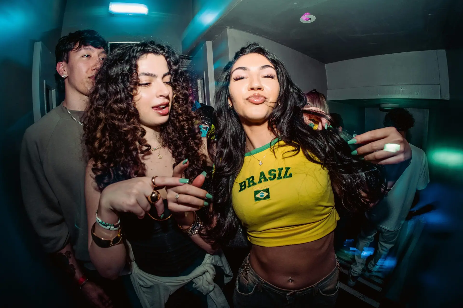 International latinas dancing and having fun in a ladies night pubcrawl